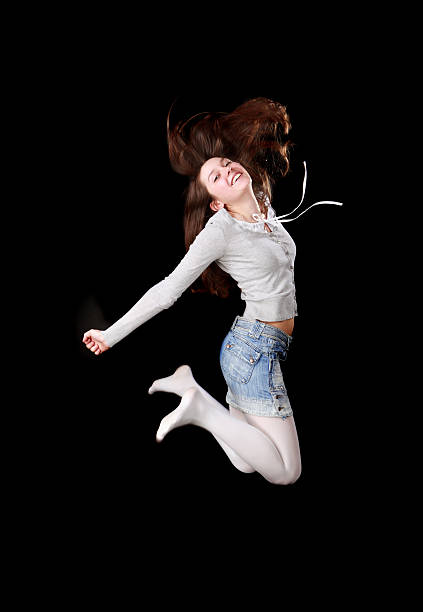 istock Young girl jumping 147068745