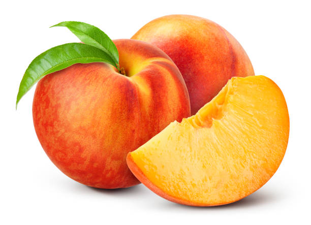 istock Peach isolated. Whole peaches with a slice on white background. Peach fruit with leaf and cut piece. With clipping path. Full depth of field. 1470688031