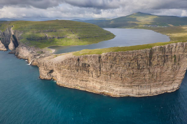 istock Faroe islands dramatic coastline in Vagar. Leitisvatn lake 1470688388