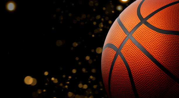 istock single basketball on black background with abstract lights 1470689439