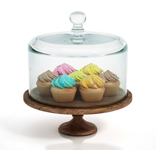 Glass domed cake plate or punch bowl with colorful cupcakes