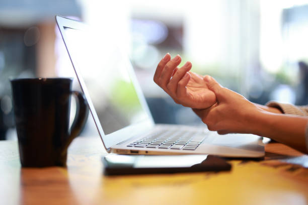 istock Woman suffering from wrist joint pain 1470690273