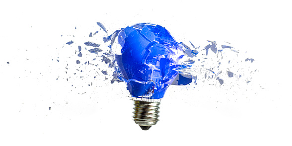 blue bulb destroying on white background, high speed photography.