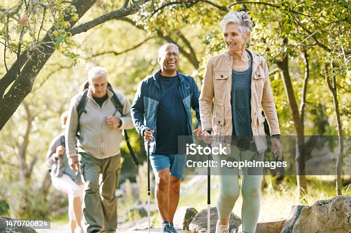 istock Hiking, elderly and people, happy outdoor with nature, fitness and fun in park, exercise group trekking in Boston. Diversity, friends and happiness with hike, active lifestyle motivation and senior. 1470700824