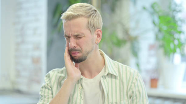 istock Portrait of Modern Young Man with Toothache 1470704845