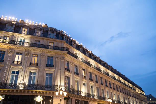 istock Illuminated traditional apartment building in Paris 1470705832