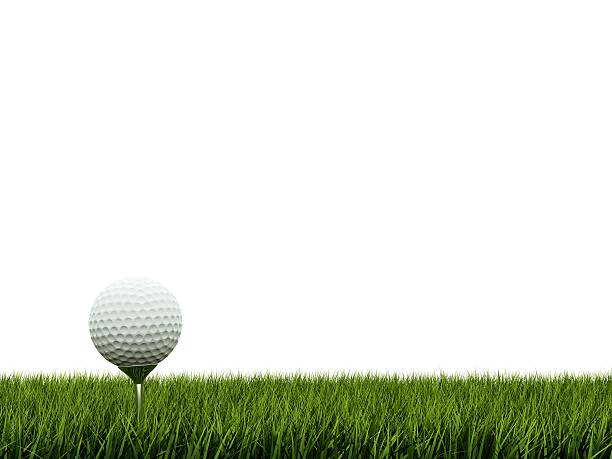 Golf ball over green grass stock photo