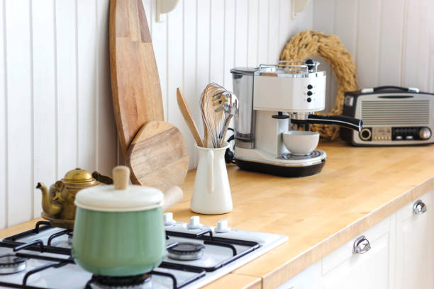 istock Kitchen wooden table and kitchen background. Interior style is cosy and scandinavian. High quality interior scandi photo. 1470708872