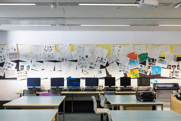 Ready for Learning A classroom in a school in Gateshead, North East England. There are computers in the room and different pieces of paper on the wall of student's work. high school english stock pictures, royalty-free photos & images