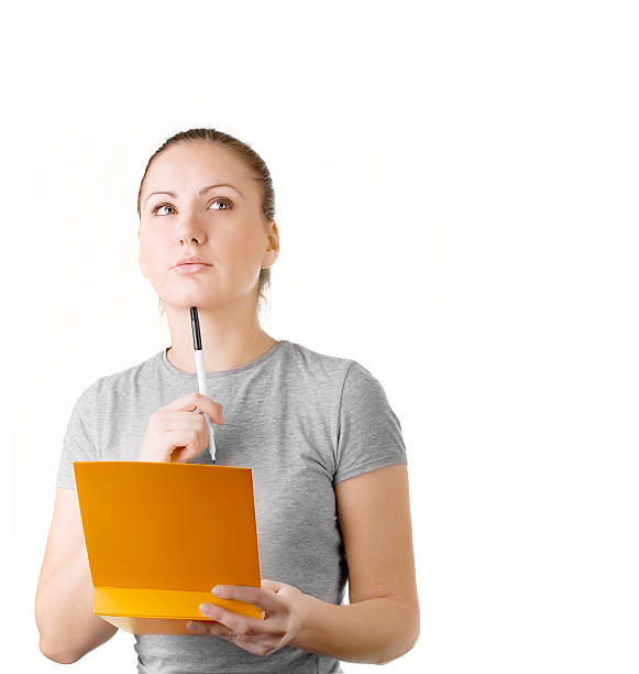istock Young woman with her pen and notepad 147071234