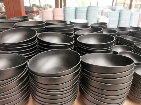Stack of black bowls in a shop