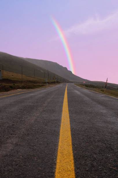 istock A rainbow is seen over a road. 1470715024