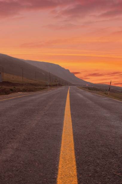 istock A road with a yellow stripe that says'road to nowhere 1470715061