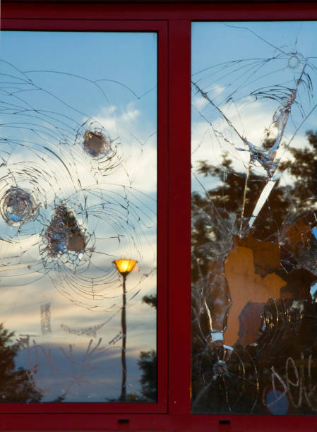 istock Close up view of broken window, broken glasses 1470717504