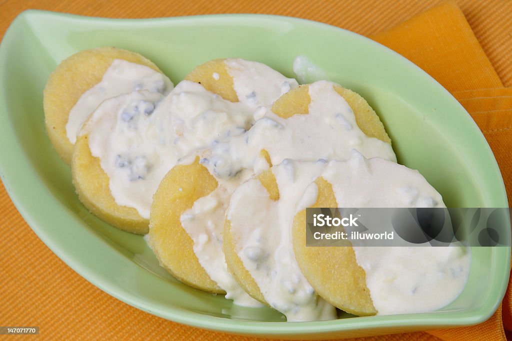 Polenta with sauce and vegetable Cereal Plant Stock Photo