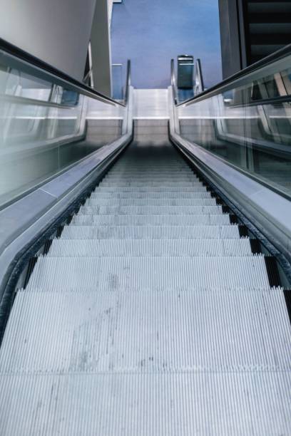 istock A vertical shot from an escalator downstairs. 1470718061