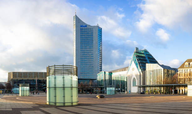 On January 3rd 2023, a panoramic view of Leipzig city center from August Square looking past the University of Leipzig, the Gewaldhaus Orchestra building and the MDR Panorama Tower