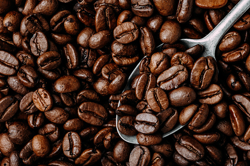 Coffee beans. Roasted coffee beans background, top view