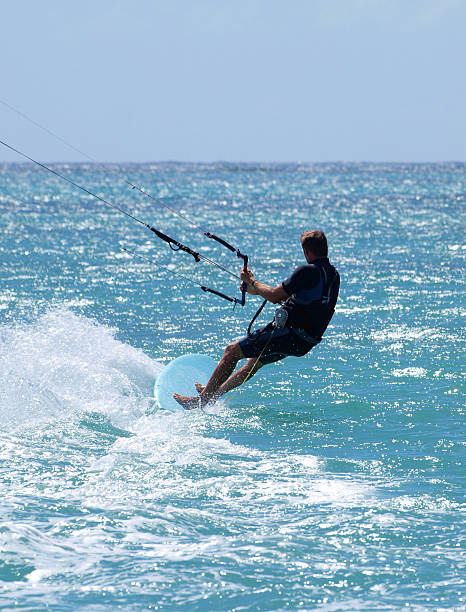 Kite Surfing Kite surfing on the Indian Ocean kiteboarding stock pictures, royalty-free photos & images