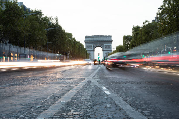 istock Light trails from traffic on the Champs-Elysees at twilight 1470726153