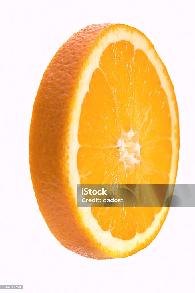 orange slice - Lizenzfrei Beleuchtet Stock-Foto