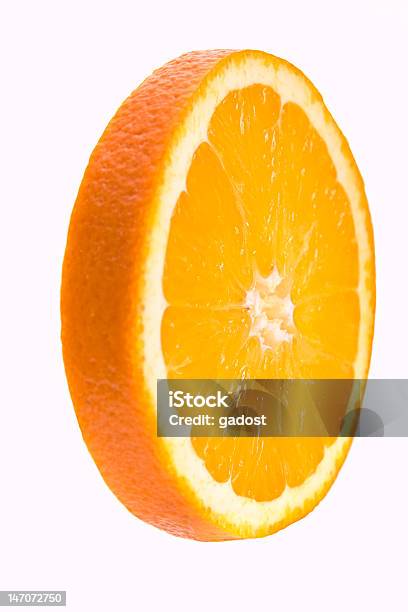 Rodaja De Naranja Foto de stock y más banco de imágenes de Alimento - Alimento, Amarillo - Color, Bebida