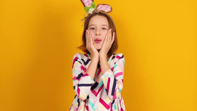 Happy playful teenager girl wearing bunny ears