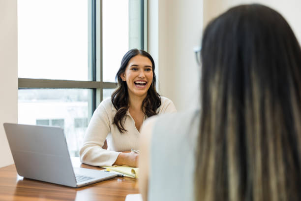 istock Unrecognizable young woman interviews for job with cheerful manager 1470735552