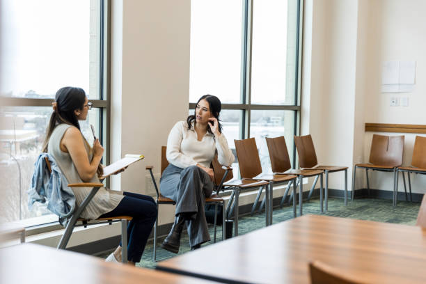 istock Female therapist asks young female client a question 1470735575