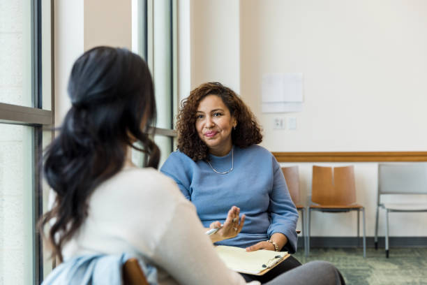 istock Female therapist waits for response from unrecognizable woman 1470735588