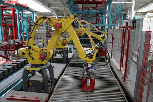 istock Yellow industrial machine working at a factory 147073568
