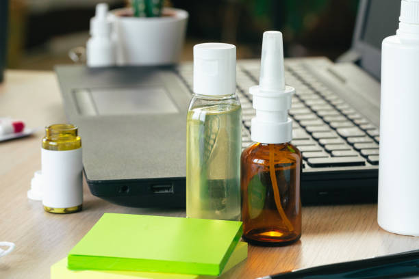 istock Medicine bottle on an office table with laptop 1470736817