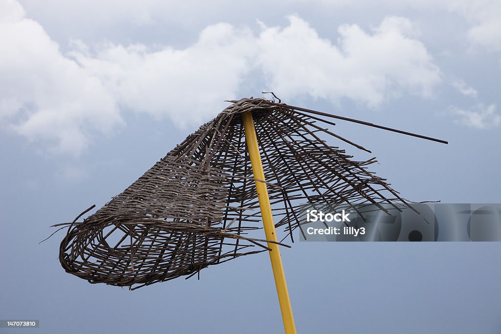 Broken Umbrella after severe Weather Broken Umbrella after severe Weather - Cirali, Turkey, Asia Accidents and Disasters Stock Photo