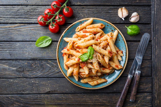 istock Penne pasta in tomato sauce 1470740268