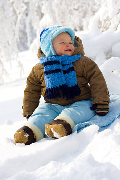 istock Baby in winter on snow 147074080