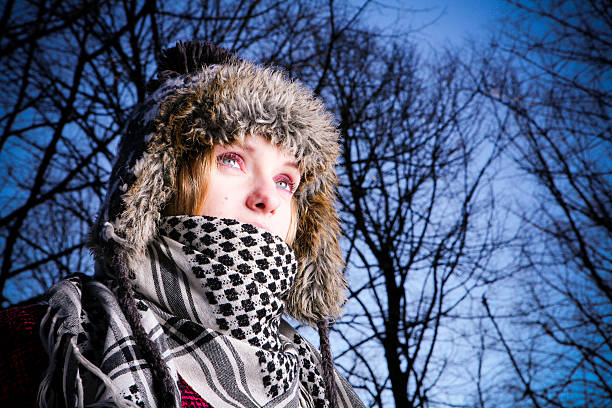 Scandinavian woman in a winter at park stock photo