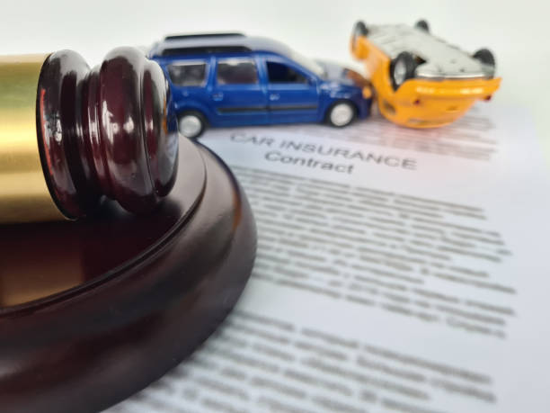 istock Judge gavel car accident and insurance contract 1470741365