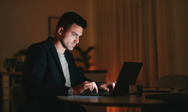istock Serious Businessman Working At Home At Night 1470741723