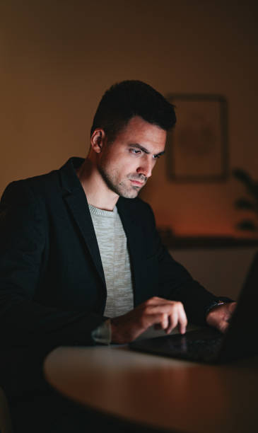 istock Worried Businessman Working At Home At Night 1470741736
