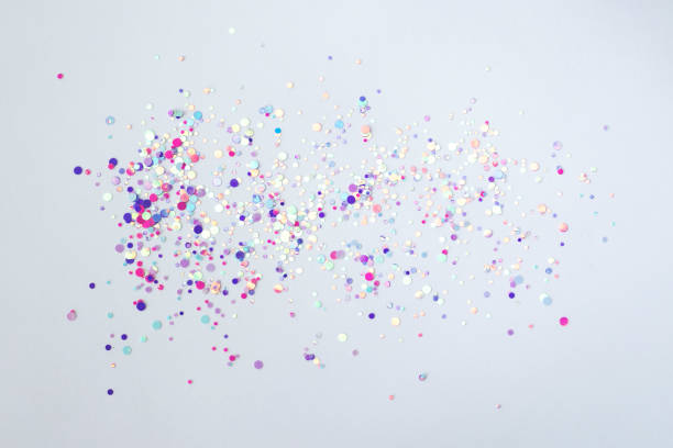 istock Pink, purple confetti glitter glitter scattered on a white background 1470743045