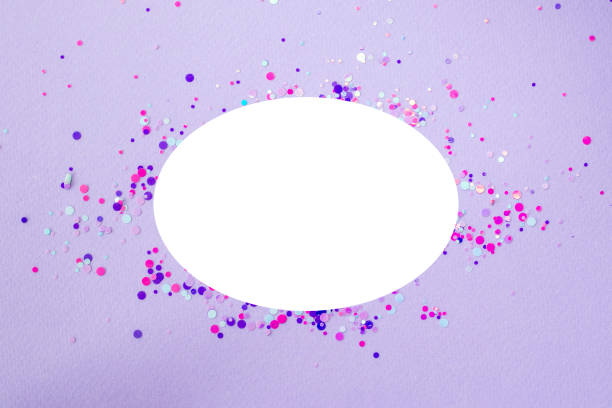 istock A light purple background with a white heart round mockup with sequins around it. 1470743046