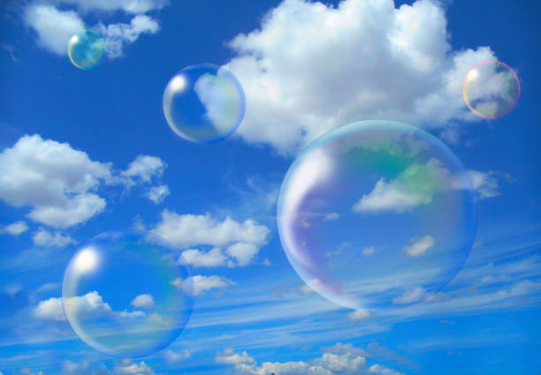 istock Soap bubbles on the background of the sky with clouds. 1470743111