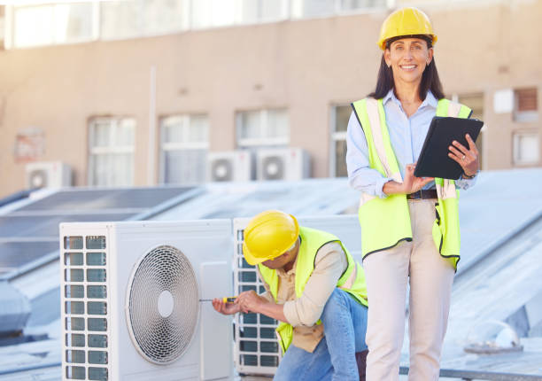 istock Air conditioner, building maintenance and teamwork with tablet, smile and development with engineer team. Engineering man, repair woman and digital tech in portrait with collaboration for ac repair 1470745380