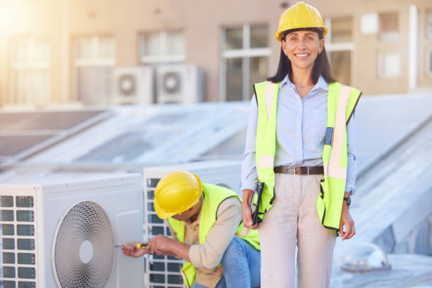istock Air conditioner, building maintenance and teamwork with tablet, smile and development with engineer team. Engineering man, repair woman and digital tech in portrait with collaboration for ac repair 1470745381