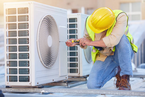 air conditioning, technician or engineer on roof for maintenance, building or construction of fan hvac repair. air conditioner, handyman or worker with tools working on a city development project job - air duct imagens e fotografias de stock