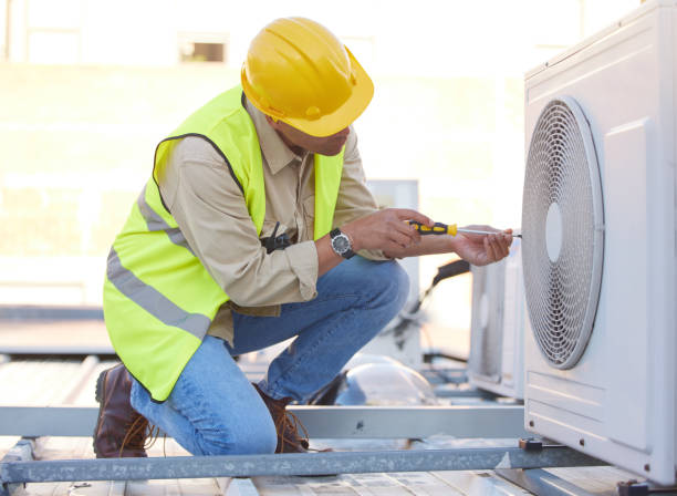 istock Air conditioning, technician or engineer on roof for maintenance, building or construction of fan hvac repair. Air conditioner, handyman or worker with tools working on a city development project job 1470745405