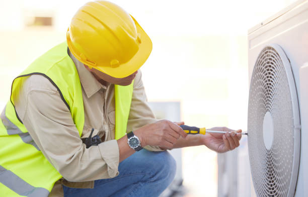 istock Air conditioning, technician or engineer on roof for maintenance, building or construction of fan hvac repair. Air conditioner, handyman or worker with tools working on a city development project job 1470745411