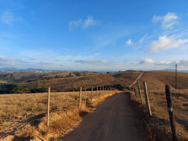 istock Countryside dirt road 1470746610