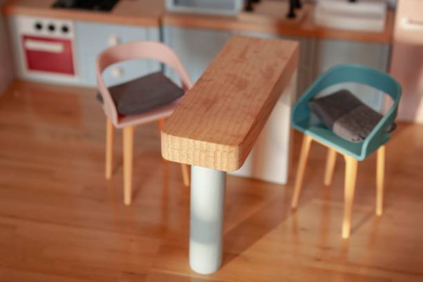 istock Miniature kitchen wooden counter chairs home interior modern decor dining area 1470747472
