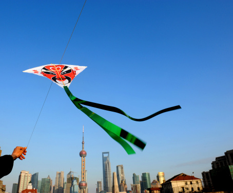 The Chinese tradition Peking opera styles of makeup kite in the landmark of shanghai.  All of the patterns on the kite without copyright/trademark .